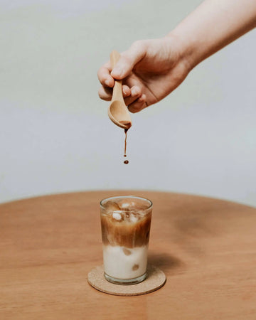 Refreshing iced masala tea latte with milk and spice, perfect summer drink