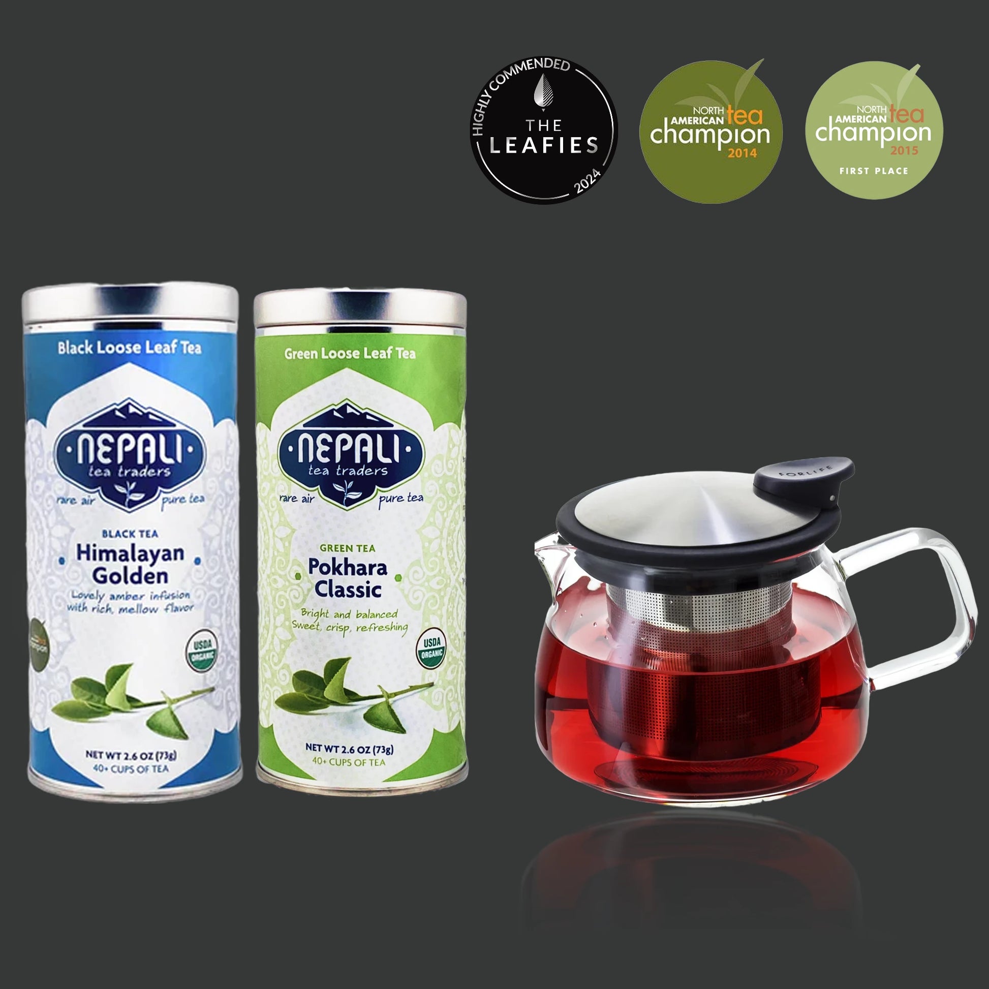 Two tins of Nepali tea with a glass teapot filled with tea on a dark background.