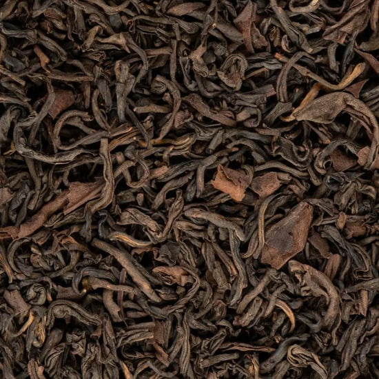 Close-up of Ruby Organic Oolong Tea loose leaves, high-mountain organic oolong from Ilam, Nepal