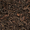 Close-up of Ruby Organic Oolong Tea loose leaves, high-mountain organic oolong from Ilam, Nepal