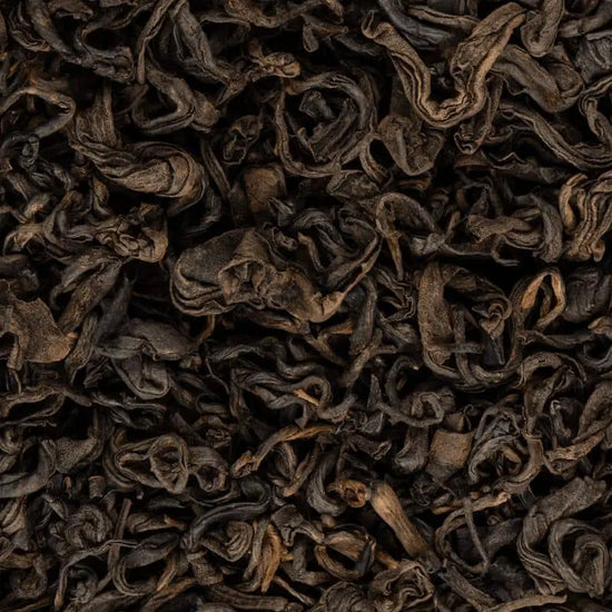Snow Leopard black tea leaves close-up, single-origin Ilam, Nepal