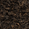 Snow Leopard black tea leaves close-up, single-origin Ilam, Nepal