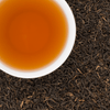 Sherpa Breakfast Organic Black Tea in cup – deep amber color, bold Nepali loose-leaf tea